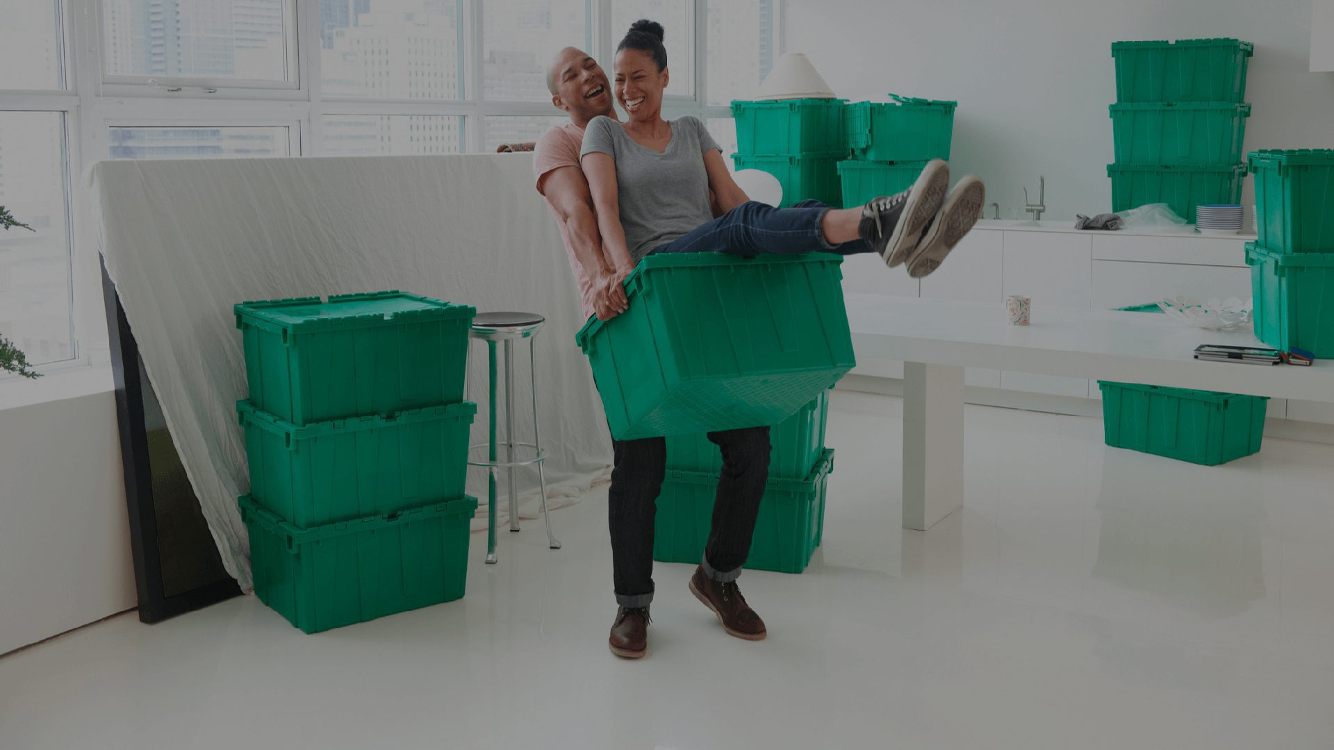 man carrying woman on moving bin-QuickTotes